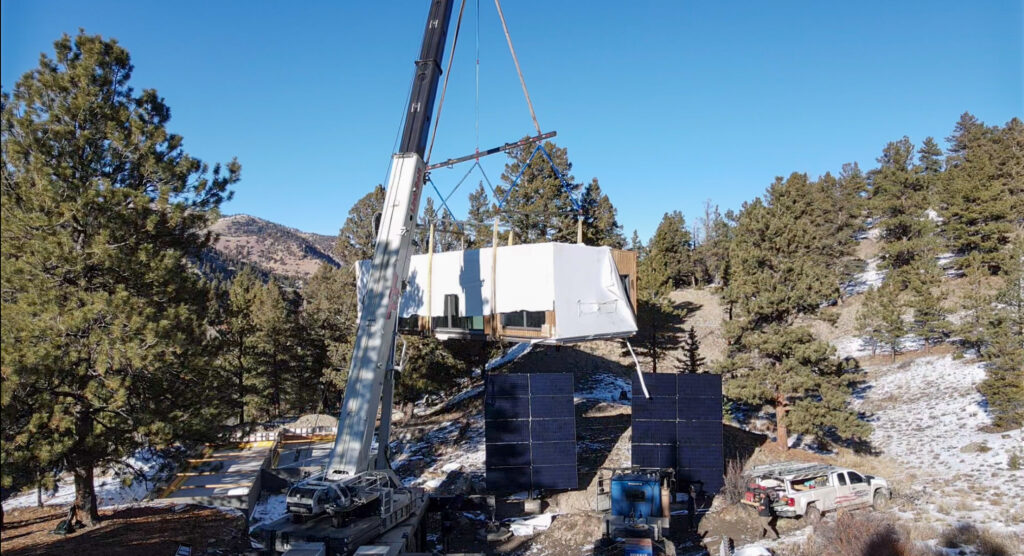 A crane was brought in to handle the task of lifting and placing pieces of
Transcend into their proper locations.
Photo courtesy of Green Builder Media