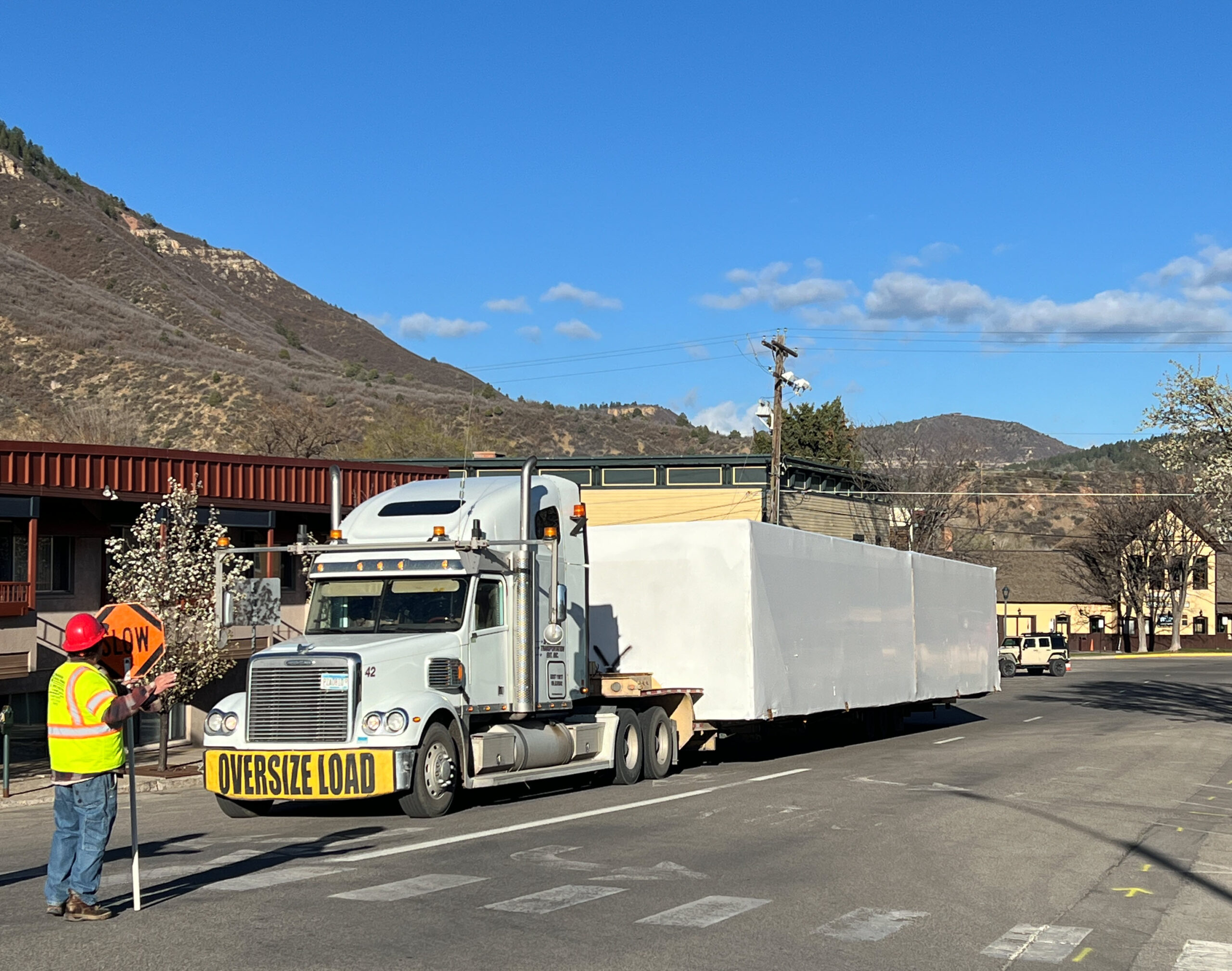 Moving an oversized load or module. The module is for a dual-brand
hotel. The owner is Lamont Companies, and the hotel was built by
NorthStar Homes in Watertown, S.D.
Photo courtesy of Specialized Transportation