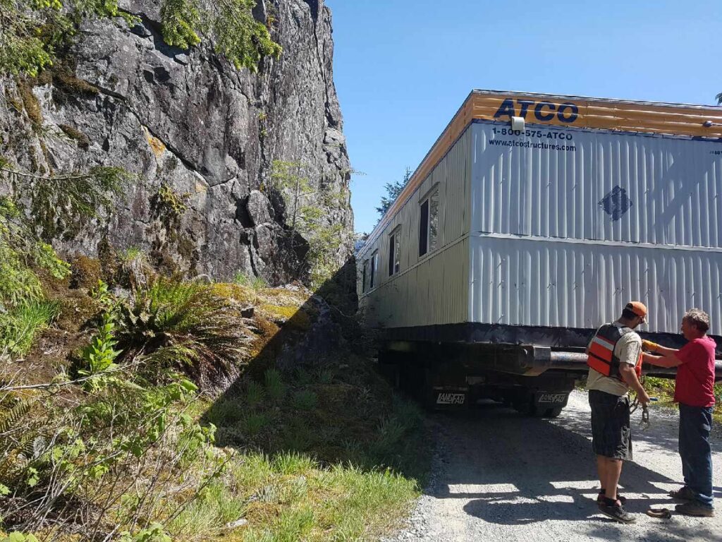 It doesn’t get much tighter than this. Maneuvering narrow winding access roads with long loads can make for a slow trip Photo courtesy of CIP Modular