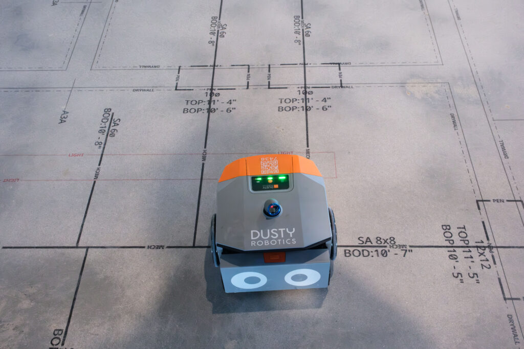 The Dusty robot prints multi-trade layout from digital files onto the concrete. Credit: Dusty Robotics