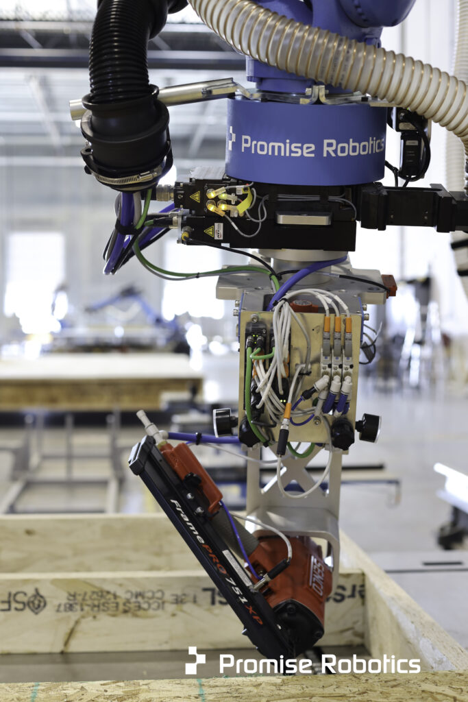 Promise uses off-the-shelf robots with their own custom tooling on the ends of the arms.