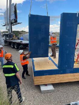 Students setting a wall panel on Day 2 of installer training Courtesy B.Public Prefab