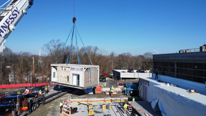 So long as local officials are contacted early and understand which responsibilities are theirs and which are the state’s, delays specific to using modular are rare. This photo shows a hospital project in Milton, Mass.