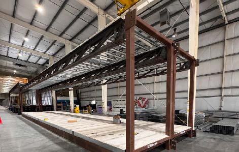 Slow decision-making can cause costly delays on the factory floor. To avoid this, Mandeville Modular imposes fines on foot-dragging clients. Credit: Mandeville Modular