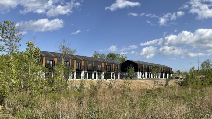 Horizon Legacy says its 26-unit townhome project in Gananoque, Ontario is “the first and largest housing development in Canada using on-site robots.” photo courtesy of Horizon Legacy