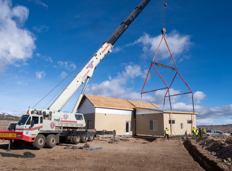 A Fading West module unit is craned into place during installation in Colorado. Photo credit: Fading West