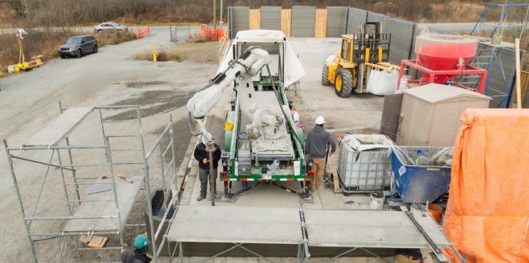 The concrete-printing robot, VAL, on-site during construction of the Gananoque townhomes photo courtesy of Horizon Legacy