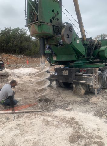 Drilling for the piers for the Villa to stand on.   photo courtesy of G-pod