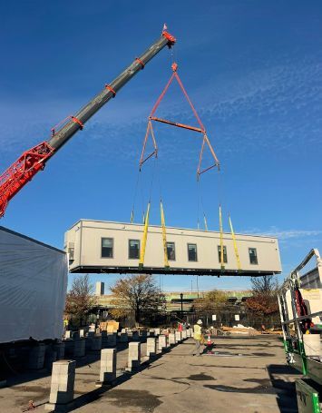 It’s important that the piers that modules sit on are wide enough to allow for the prescribed gap between modules and also slight variations in setting position. Timna worked on this project — a workforce support building at Boston’s Logan
Airport — in Boston, Mass. Credit: Knox Construction