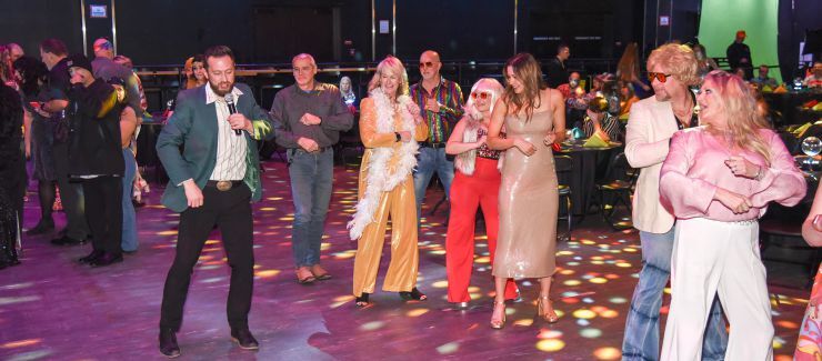 Caption: A 1970s-themed New Year’s celebration at Autovol Credit: Autovol
