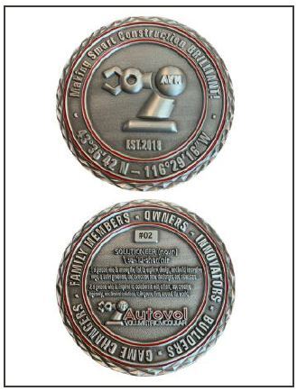 Caption: The coin that Autovol employees are awarded when recognized for excellence by their peers. Credit: Autovol